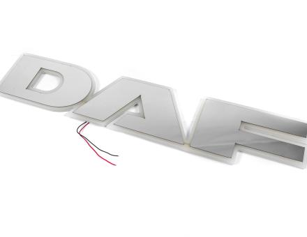 Надпис на решітку DAF нержавійка з оранжевою підсвіткою (68см.*13,5см.)