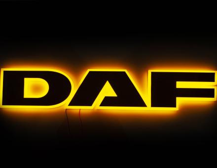 Надпис на решітку DAF нержавійка з оранжевою підсвіткою (68см.*13,5см.)