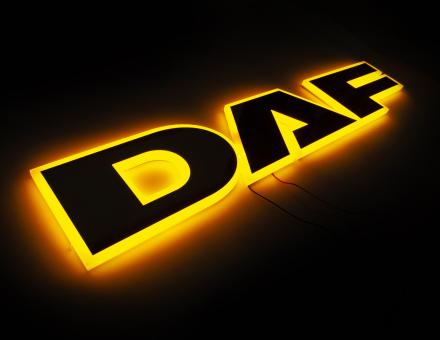 Надпис на решітку DAF нержавійка з оранжевою підсвіткою (68см.*13,5см.)