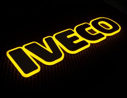 Надпис на решітку Iveco нержавійка з оранжевою підсвіткою (60см.*14см.)