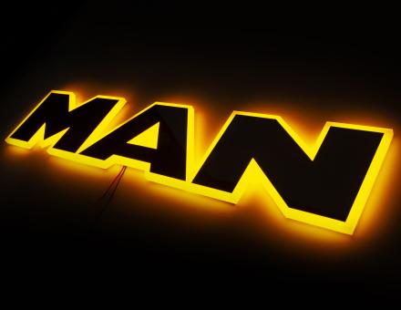 Надпис на решітку Man нержавійка з оранжевою підсвіткою (63см.*13,5см.)
