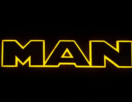 Надпис на решітку Man нержавійка з оранжевою підсвіткою (63см.*13,5см.)