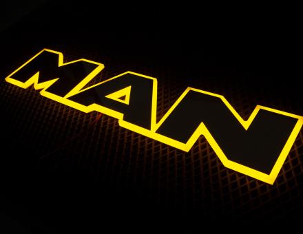 Надпис на решітку Man нержавійка з оранжевою підсвіткою (63см.*13,5см.)