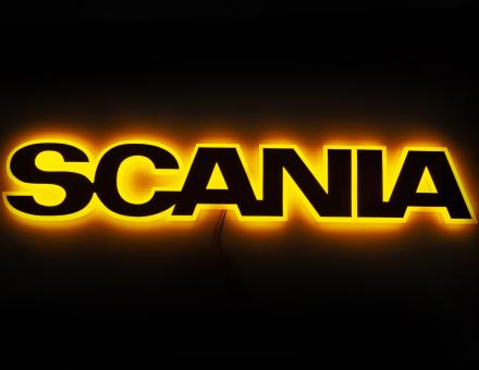 Надпис на решітку Scania нержавійка з оранжевою підсвіткою (82см.*14см.)