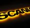 Надпис на решітку Scania чорний з оранжевою підсвіткою (82см.*14см.)